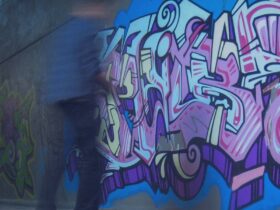 Street artist working on a project