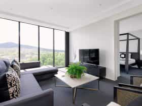 Situated on a high floor with breathtaking views over Glebe Park and Mount Ainslie