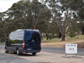 Mercedes tour vehicle on the road