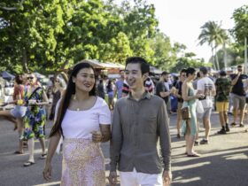 Couple enjoying themselves at the Mindil Beach sunset markets