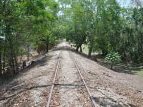 Remnant of railway track and mound.