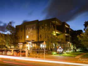 External night shot of the building