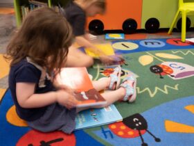 Child reading in the Story Place