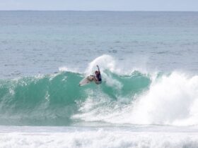 female surfing